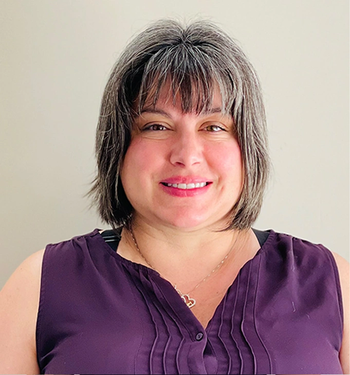 leanne huvenaars staff portrait smiling at dental clinic in tisdale, sk